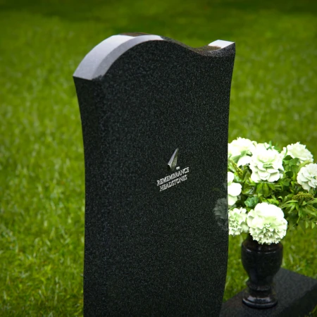 Modern wave design headstones shaped for graceful memorial tribute.
