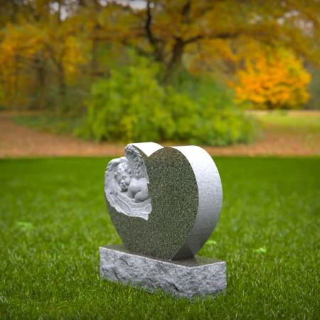 Grace-borne tombstones showing baby at rest on heartstone