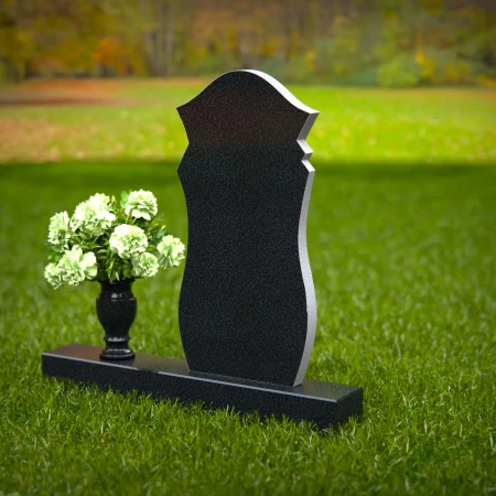 Elegant curved granite headstones crafted as a timeless memorial tribute.