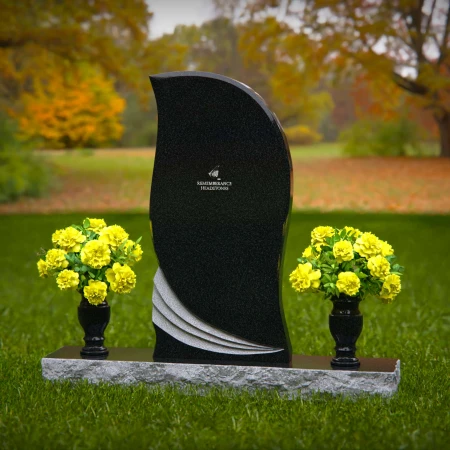 Elegant curved granite headstones with wave accents for timeless memorials.