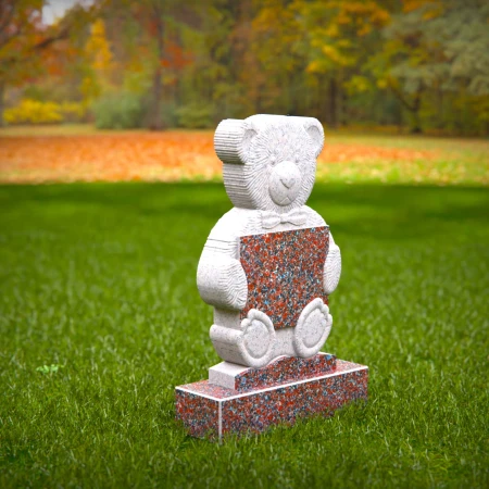 Sympathetic grave markers for kids featuring plaque-holding teddy