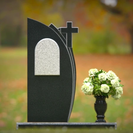 Unique headstones featuring a cross and elegant plaque design.