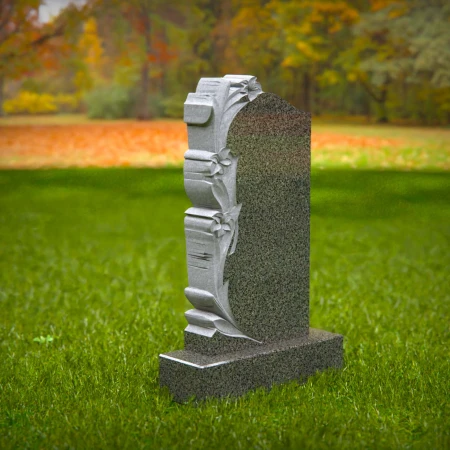Petal patterns and vine carvings enhance meaningful grave markers