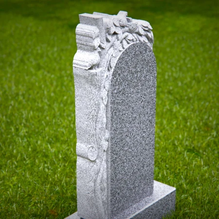 Organic shapes carved with intention express memory in headstone prices