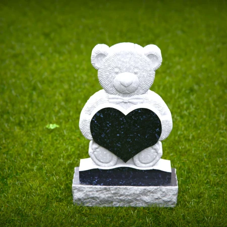 Blessed headstone near me engraved with child’s heart and teddy