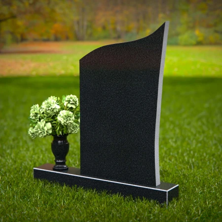 Modern headstones featuring flowing curved design and floral vases.
