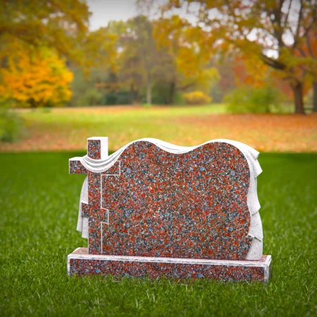 A meaningful cross tribute enhanced by elegant cloth motifs in headstone prices