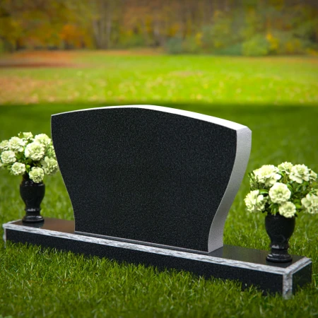 Elegant double vase headstones with contoured design for tribute.