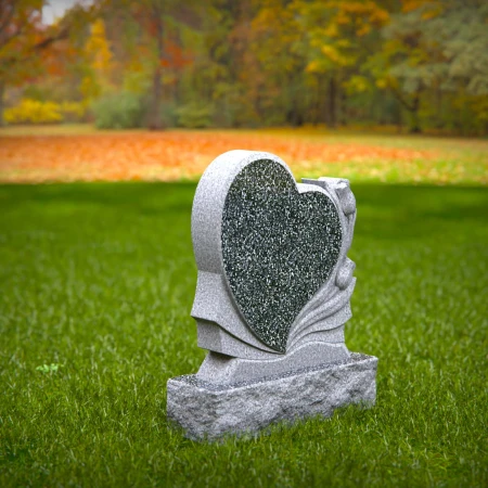 Carved hearts offer a peaceful message in graceful headstones
