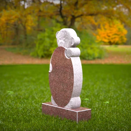 Playful memorials with sculpted bear for children’s headstones