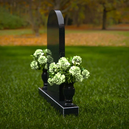 Elegant headstones with arched design symbolizing timeless memory.