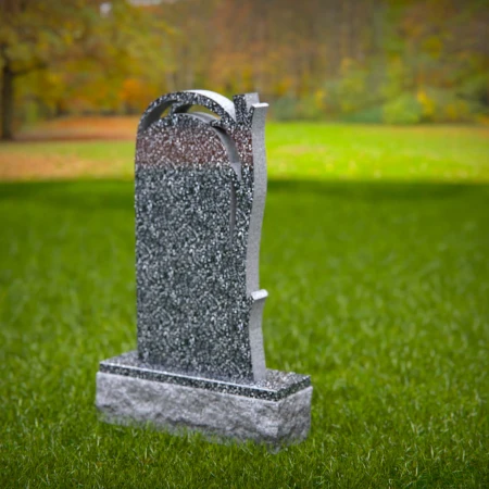 The sheltering arch over a life-giving tree defines these tombstones