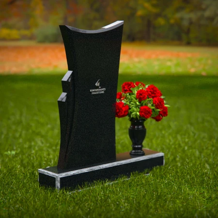 Contemporary granite headstones with unique shape and flower vase.