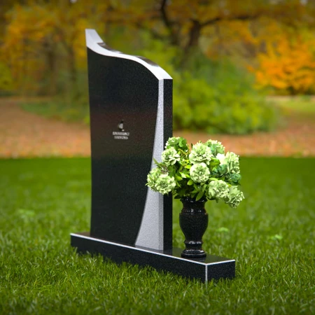 Modern headstones featuring flowing curved design and floral vases.