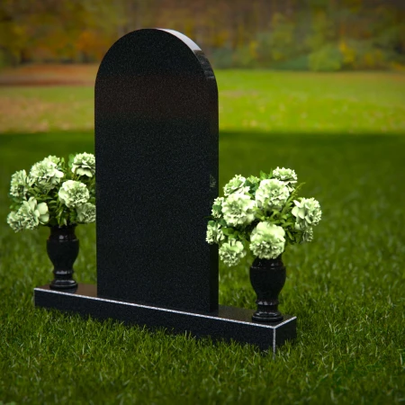 Elegant headstones with arched design symbolizing timeless memory.