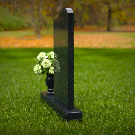 Granite headstones featuring a cross design and flower vase.