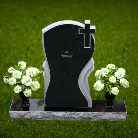 Graceful memorial headstones with cross detail for sacred remembrance.