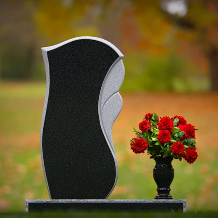 Modern wave design headstones with elegant detailing for tribute.