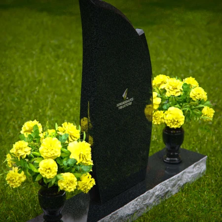Elegant asymmetrical granite headstones crafted as unique memorial tributes.