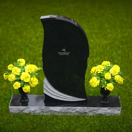 Elegant curved granite headstones with wave accents for timeless memorials.