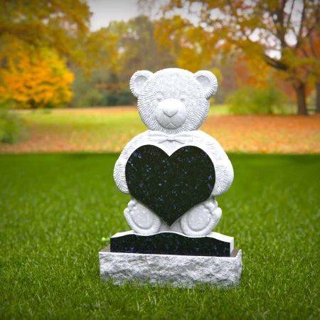 Blessed headstone near me engraved with child’s heart and teddy