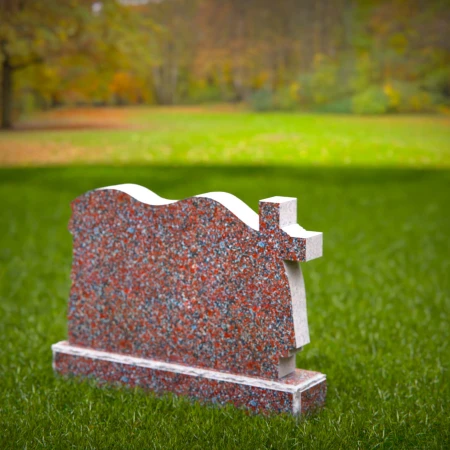 A meaningful cross tribute enhanced by elegant cloth motifs in headstone prices