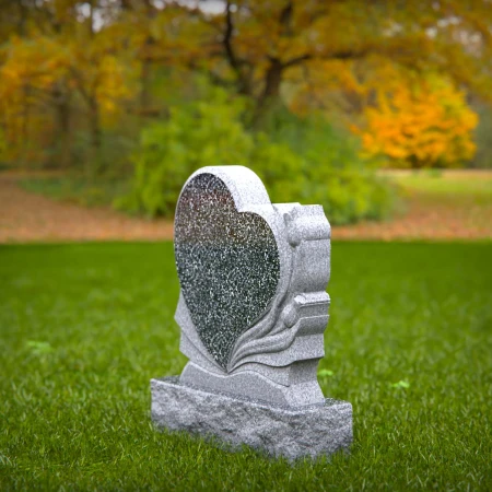 Carved hearts offer a peaceful message in graceful headstones