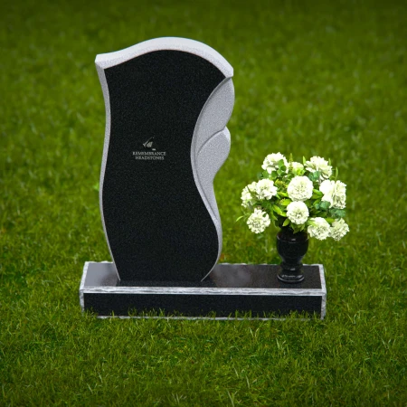 Modern wave design headstones with elegant detailing for tribute.