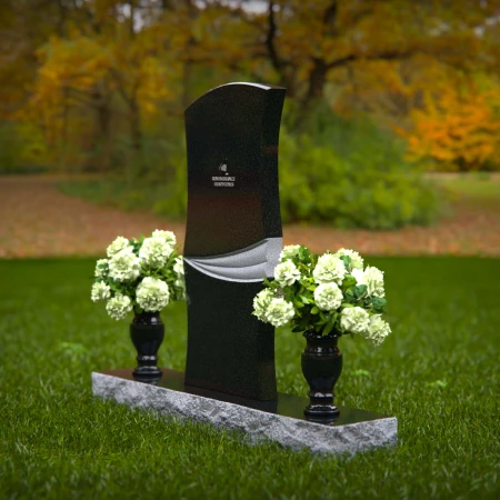Elegant curved granite headstones with a timeless memorial design.