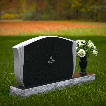 Elegant contoured headstones with flower vase for refined tribute.