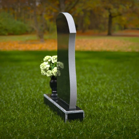 Modern curved headstones with elegant design for graceful memorials.