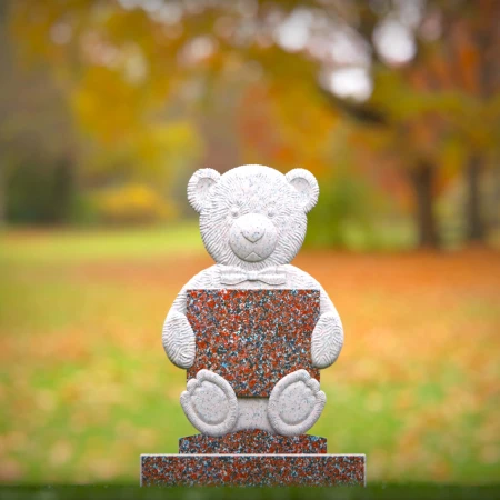 Sympathetic grave markers for kids featuring plaque-holding teddy
