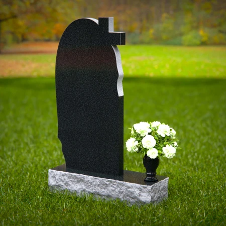 Graceful asymmetrical granite headstones with cross, symbolizing faith and remembrance.