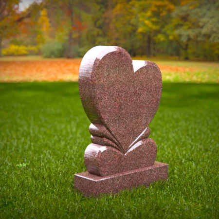 dual heart headstone etched with timeless emotional depth for memorials
