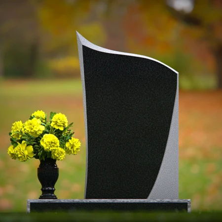 Modern curved memorial headstones crafted with elegant simplicity.