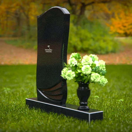 Elegant curved granite headstones with layered detailing for timeless memorials.