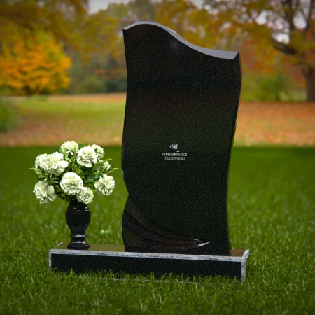 Elegant granite headstones featuring a wave motif design for timeless memorials.