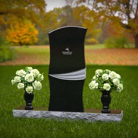 Elegant curved granite headstones with a timeless memorial design.