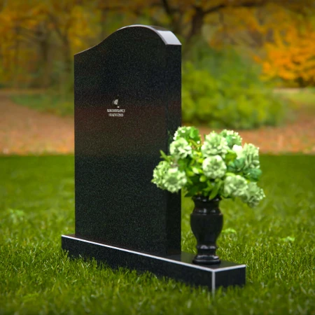 Timeless upright headstones with rounded top for elegant tribute.