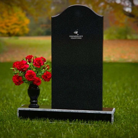 Classic upright headstones with flower vase for timeless memorials.