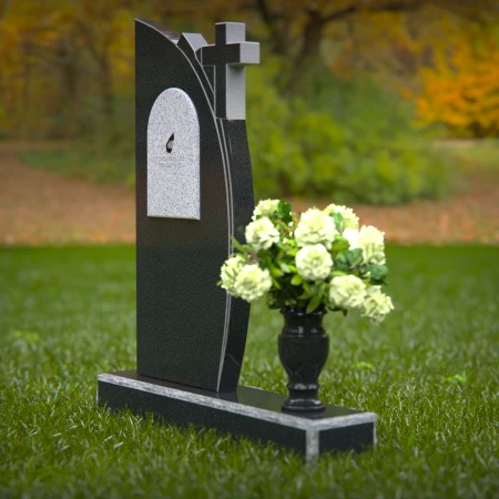 Unique headstones featuring a cross and elegant plaque design.