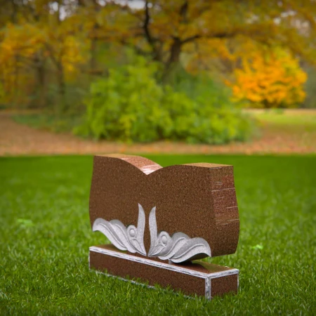 Elegant storytelling carved into this open book headstone prices