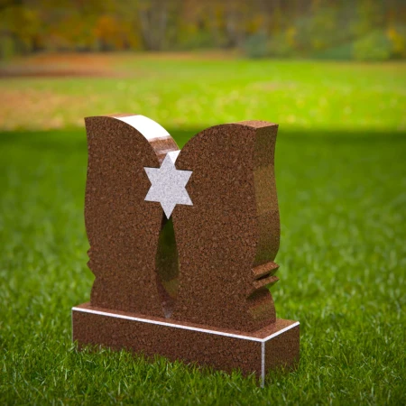 Elevated headstone designs balanced between grace and might