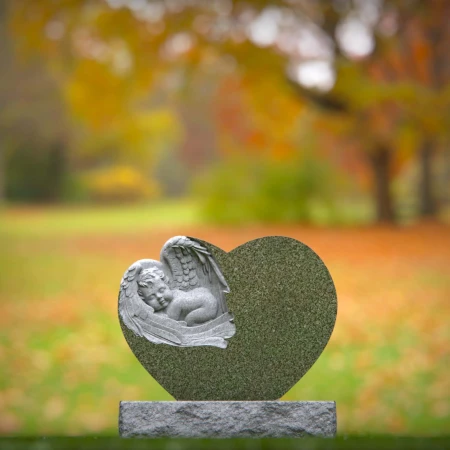 Grace-borne tombstones showing baby at rest on heartstone