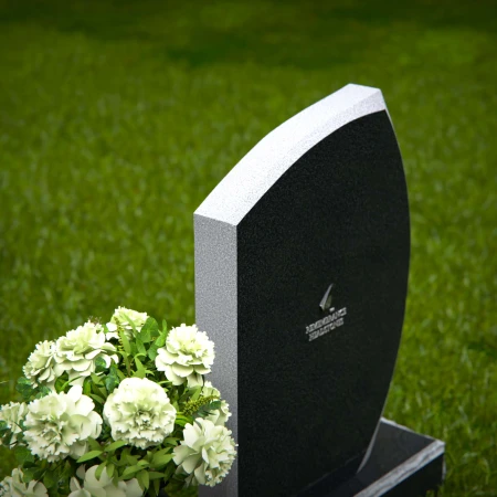 Modern angled granite headstones with vase inclusion for tribute.