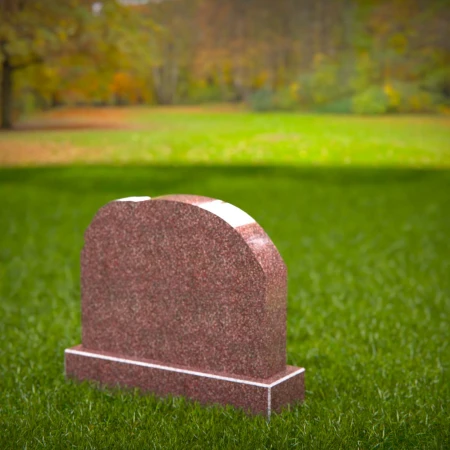 deeply personal headstone with sculpted dog detail for headstones