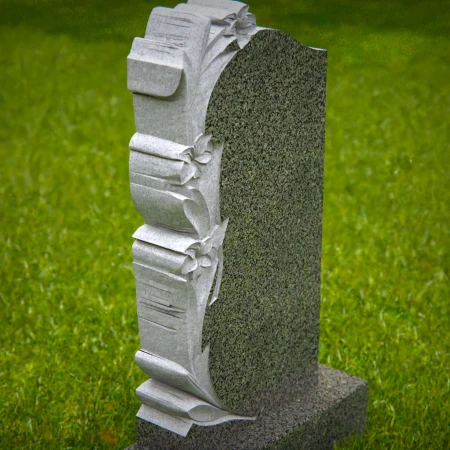Petal patterns and vine carvings enhance meaningful grave markers