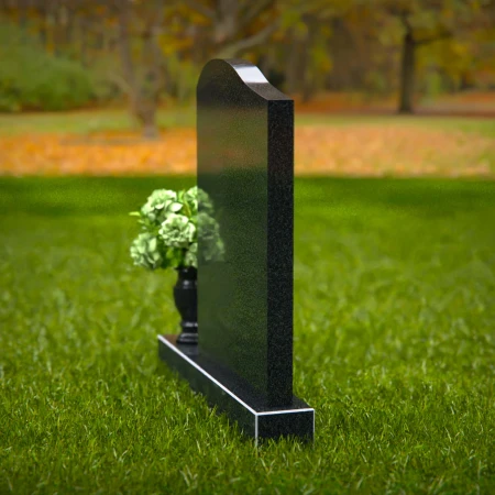 Timeless upright headstones with rounded top for elegant tribute.