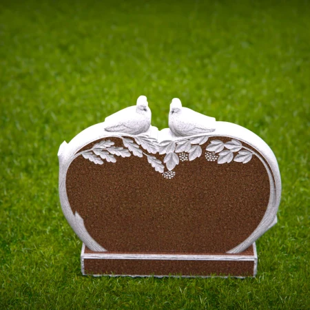 paired birds carved into granite for timeless remembrance for headstones