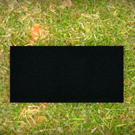 Compact headstones featuring photo inlays and floral vases for memorials.